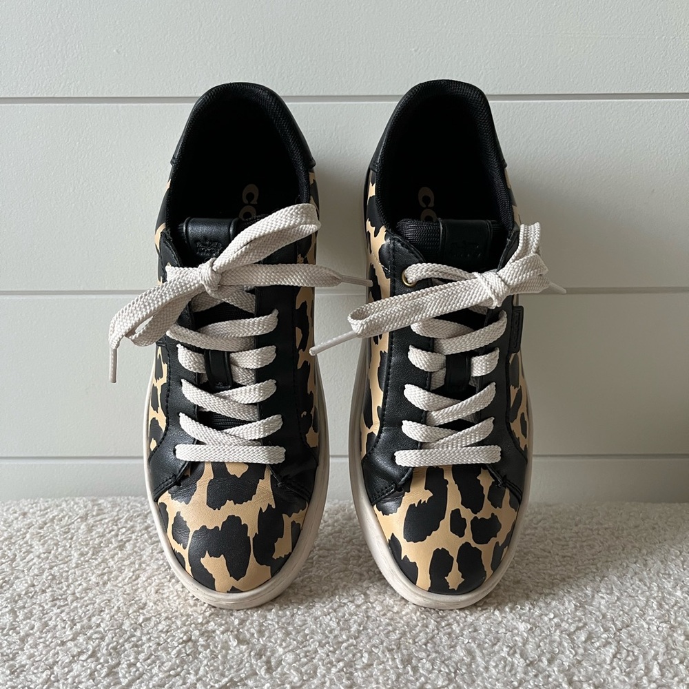 Coach sneaker size 5.5 (run 1/2 size large)